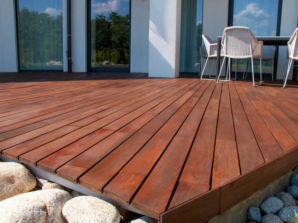 Stained wooden deck painting by Harrogate Decorators