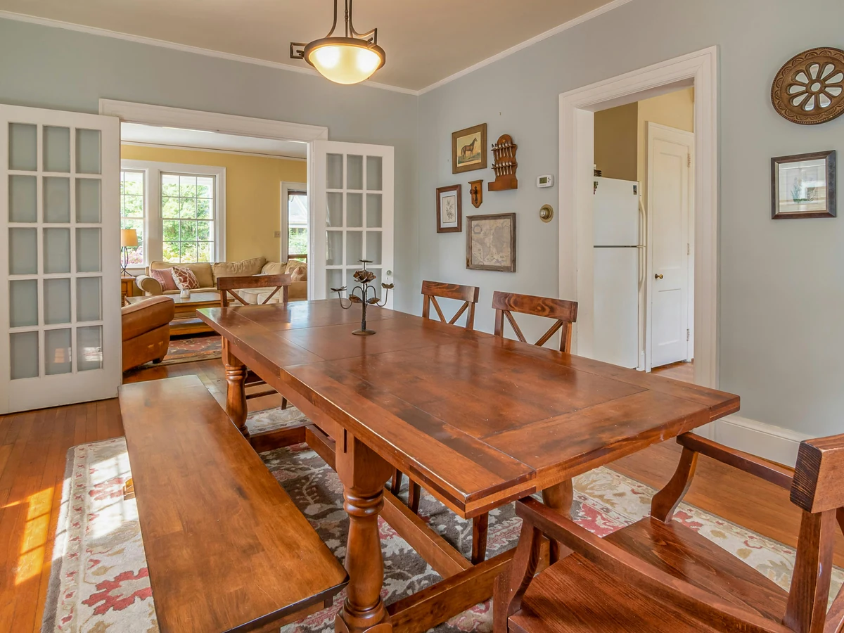 Open-plan dining room painting in Harrogate with coordinated colour scheme across kitchen and dining zones