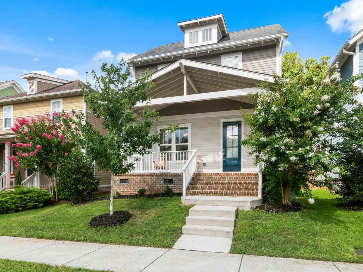 exterior-painting-suburban-house-covered-harrogate-decorators Window frame painting on suburban house exterior in Harrogate by Harrogate Decorators