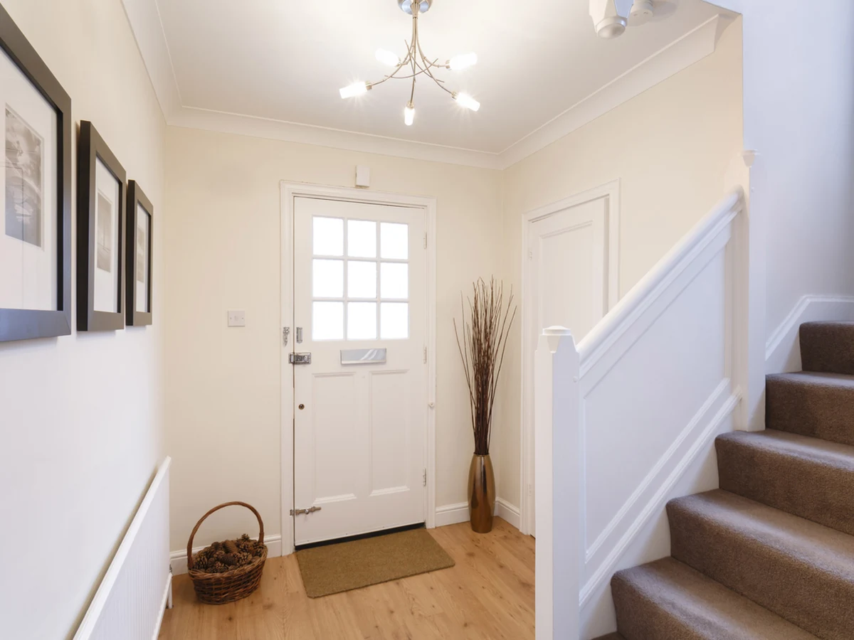 Bright white entrance hallway painting in Harrogate by Harrogate Decorators