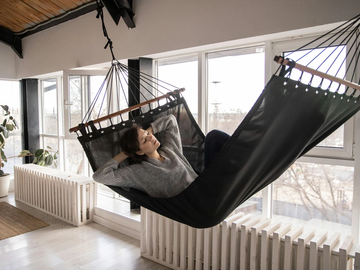 interior-painting-person-relaxing-hammock-harrogate-decorators Interior painting relaxed home setting in Harrogate by Harrogate Decorators