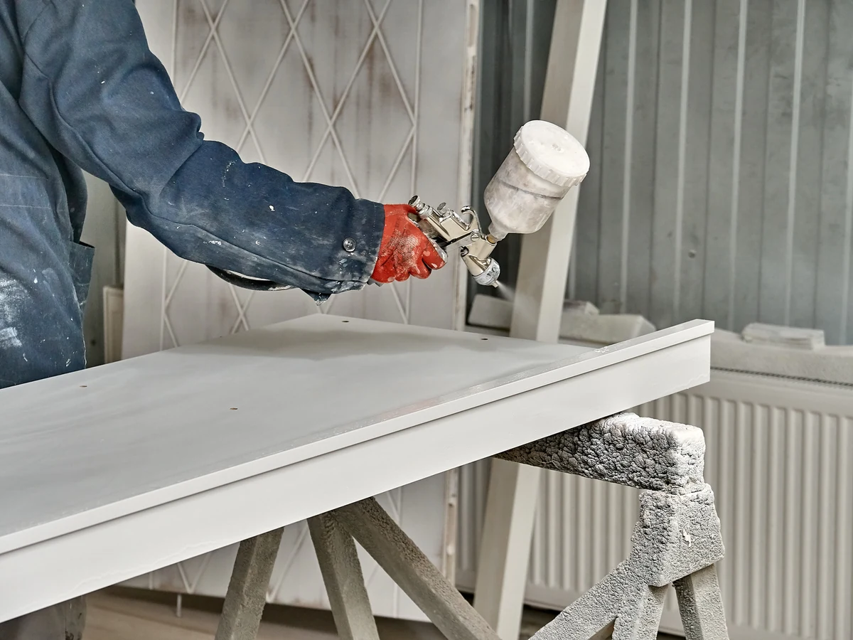 Home renovation decorating in Harrogate by Harrogate Decorators, painter spraying white finish